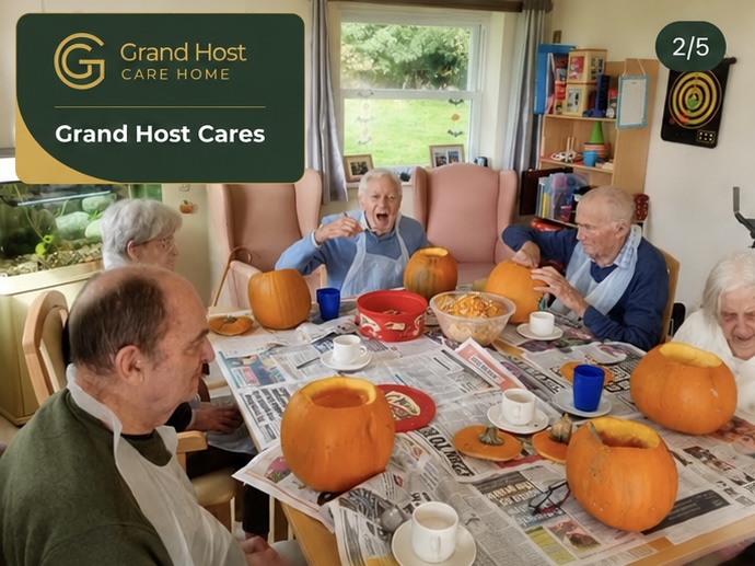 Residents carving pumpkins together at the table
